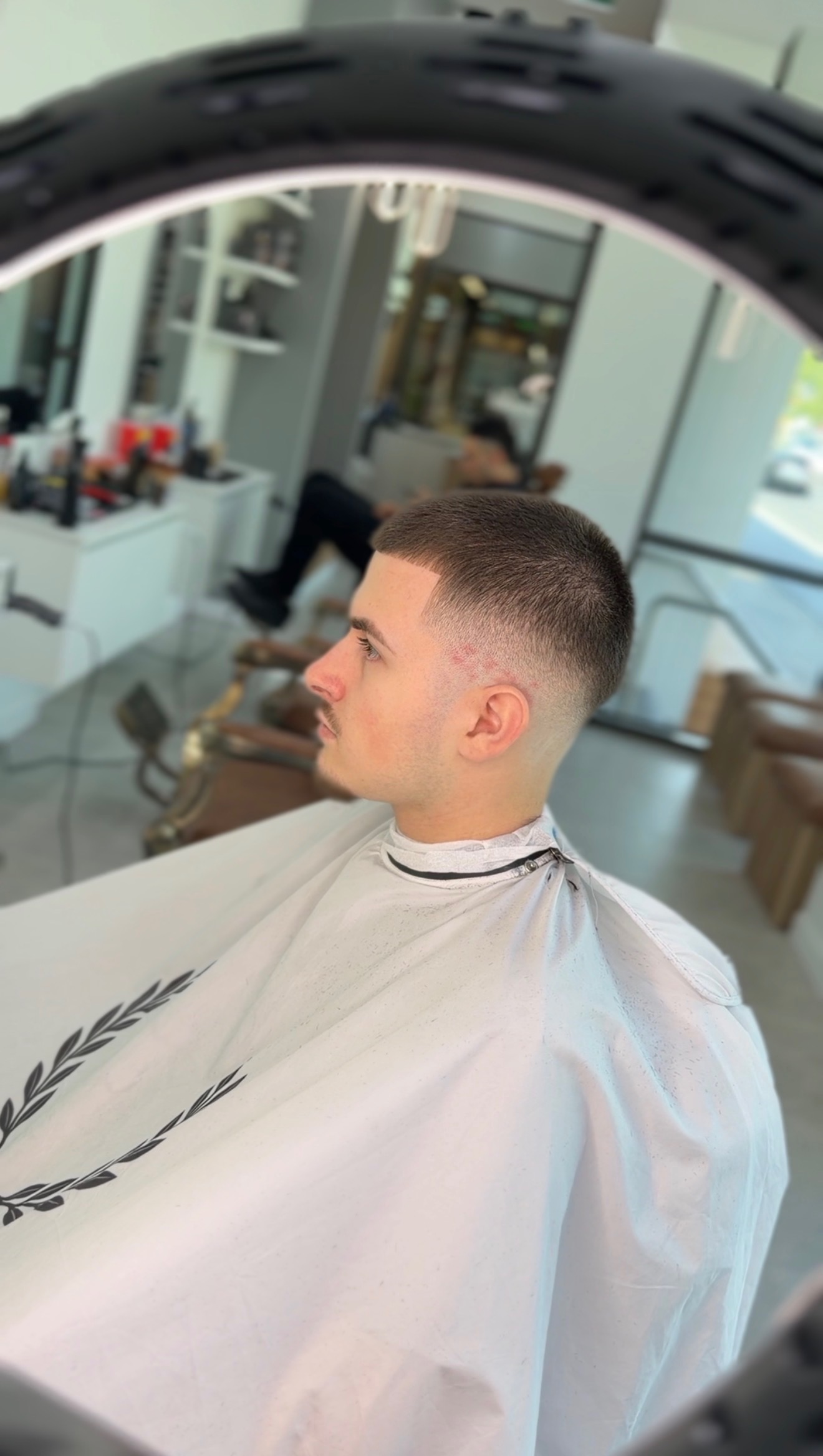 Skin fade with a custom shaved hair design